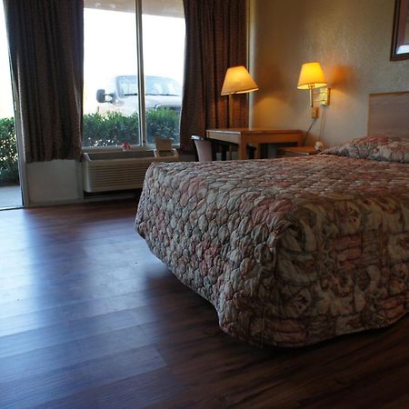 Executive Inn & Suites Orange Ruang foto
