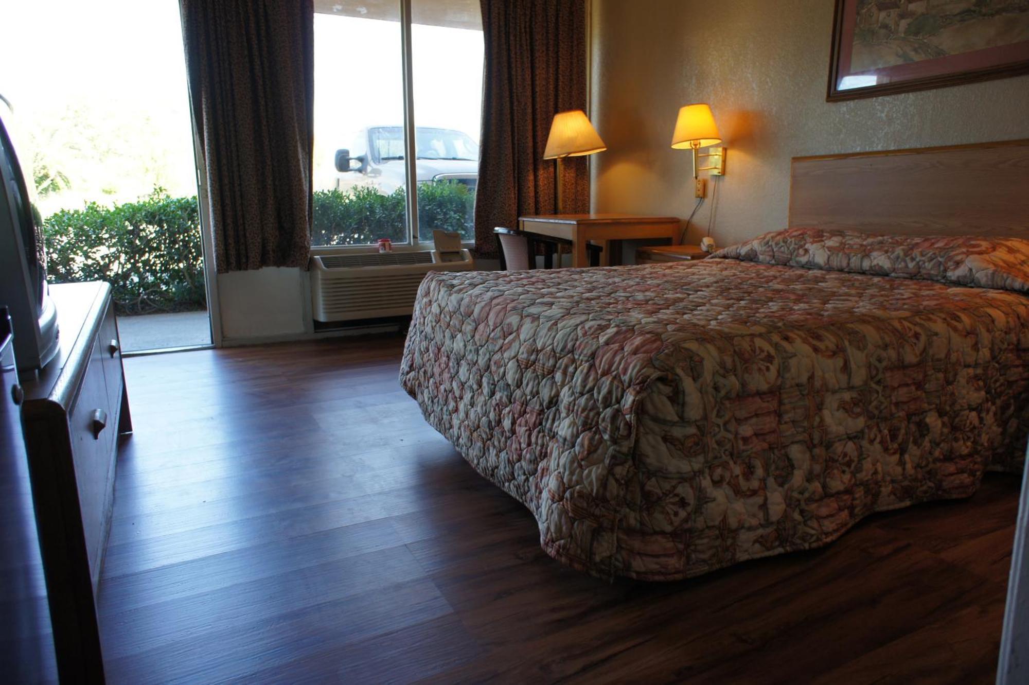 Executive Inn & Suites Orange Ruang foto