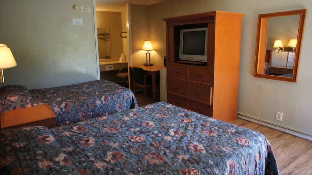 Executive Inn & Suites Orange Bagian luar foto