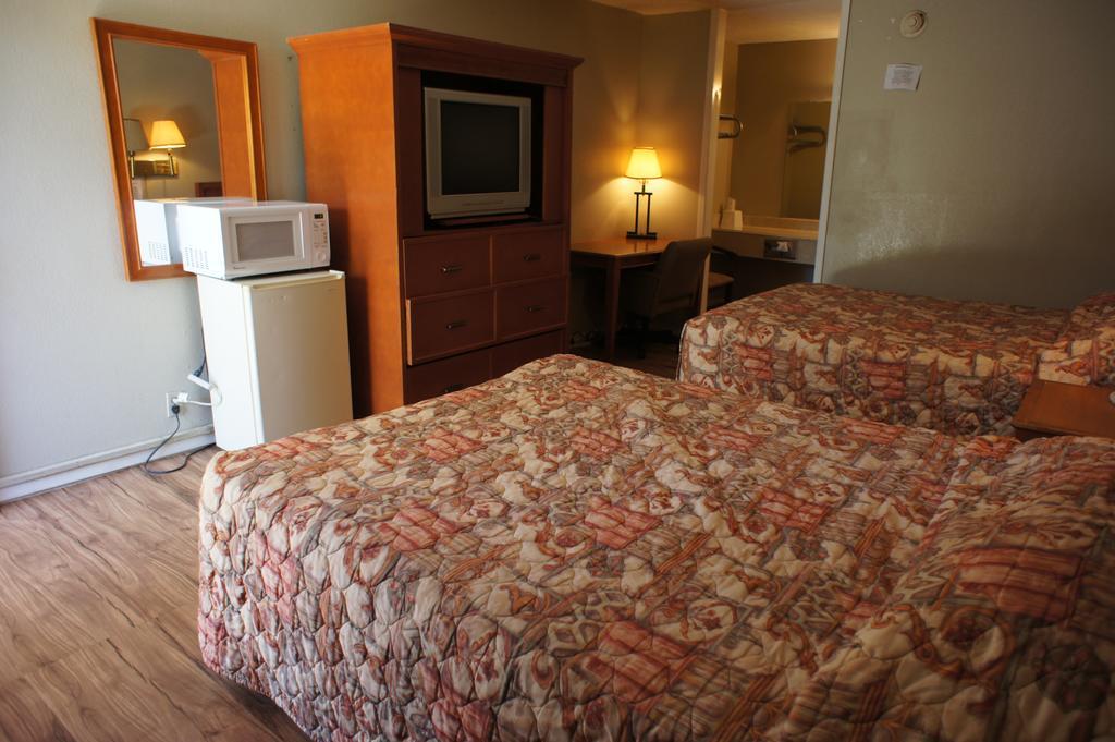 Executive Inn & Suites Orange Bagian luar foto
