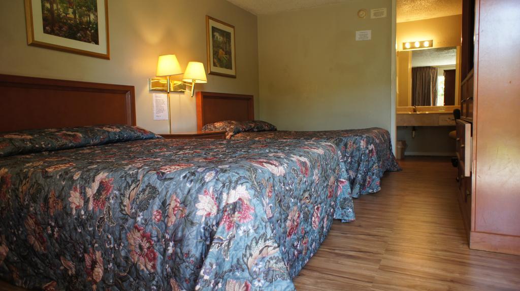 Executive Inn & Suites Orange Bagian luar foto