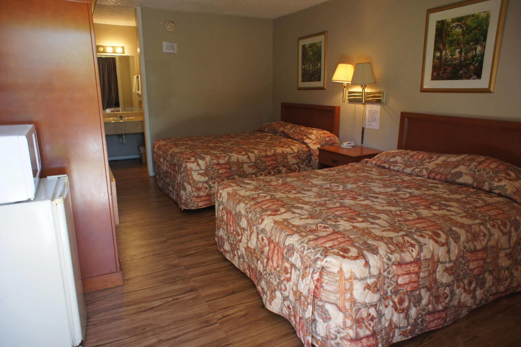 Executive Inn & Suites Orange Bagian luar foto