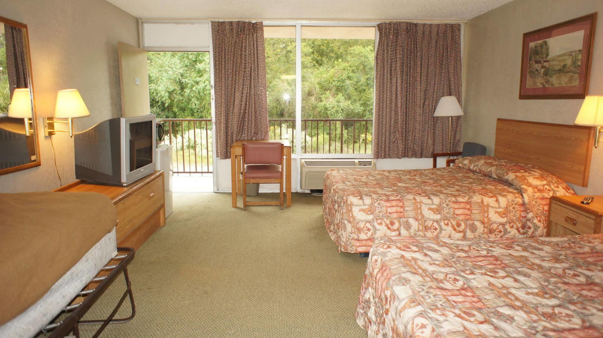 Executive Inn & Suites Orange Bagian luar foto